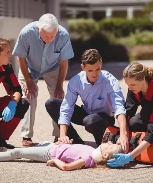 paramedics-examining-injured-girl